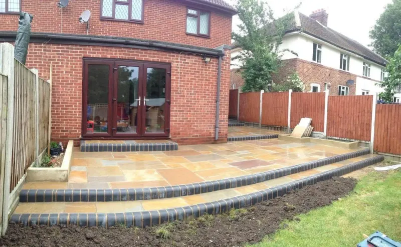 Multi-level residential patio and garden landscaping under construction